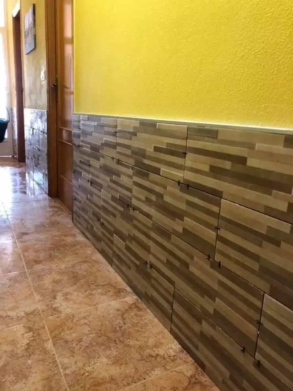Wall with new tiles